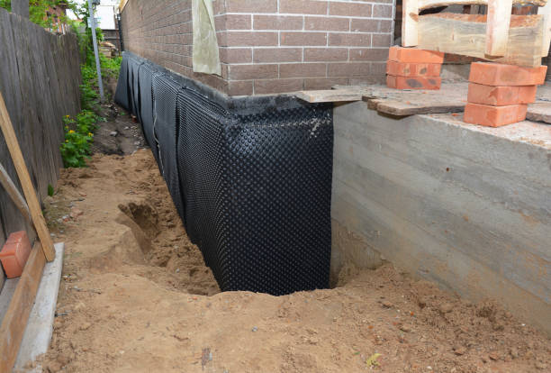 Happy homeowners after waterproofing job in Berrien Springs